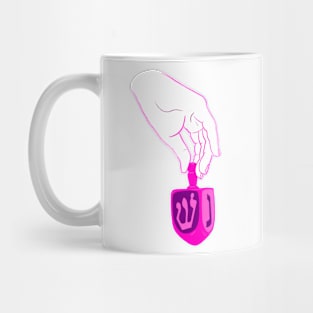 Hand turning dreidl Mug